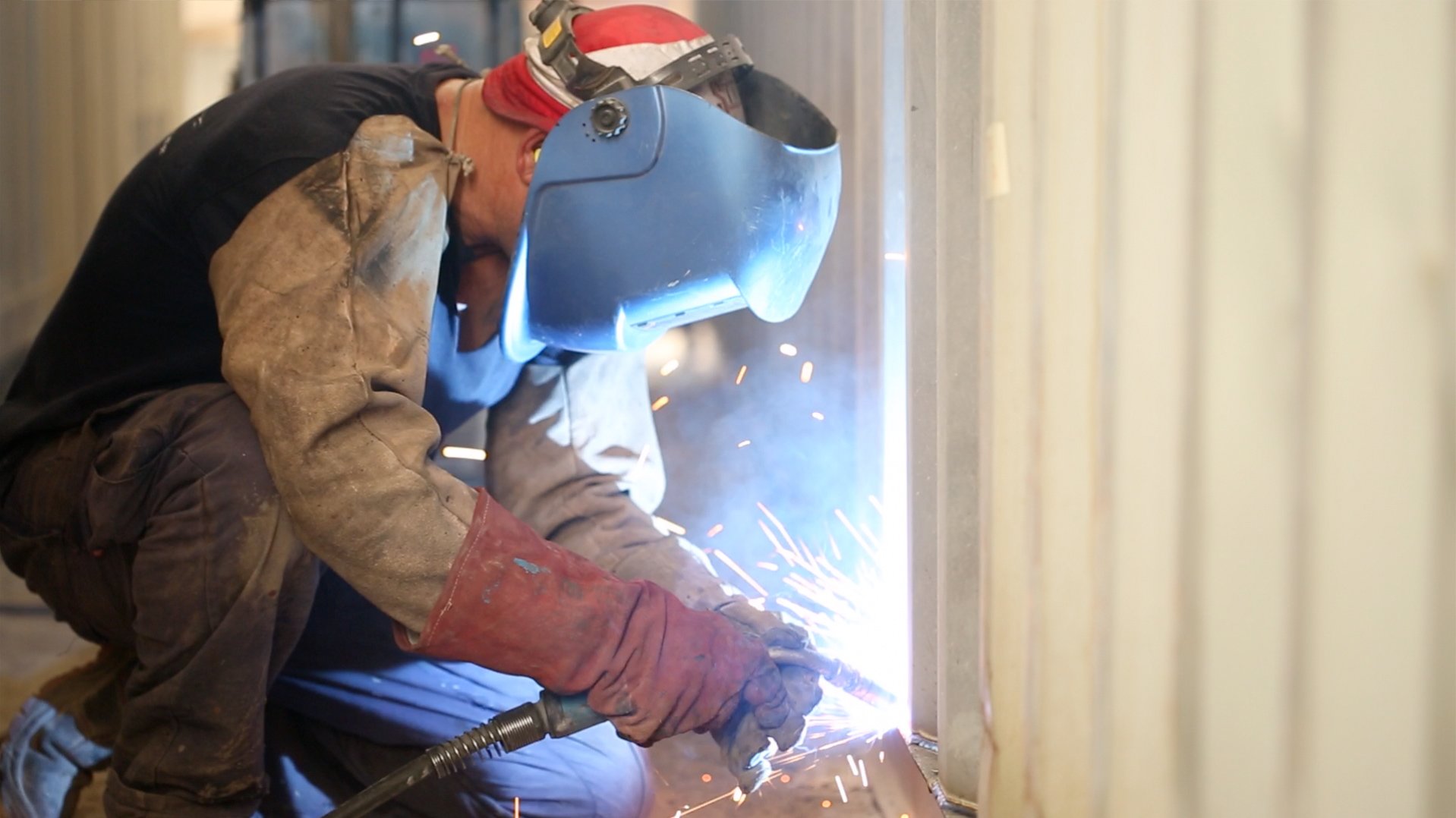 Man welding a container